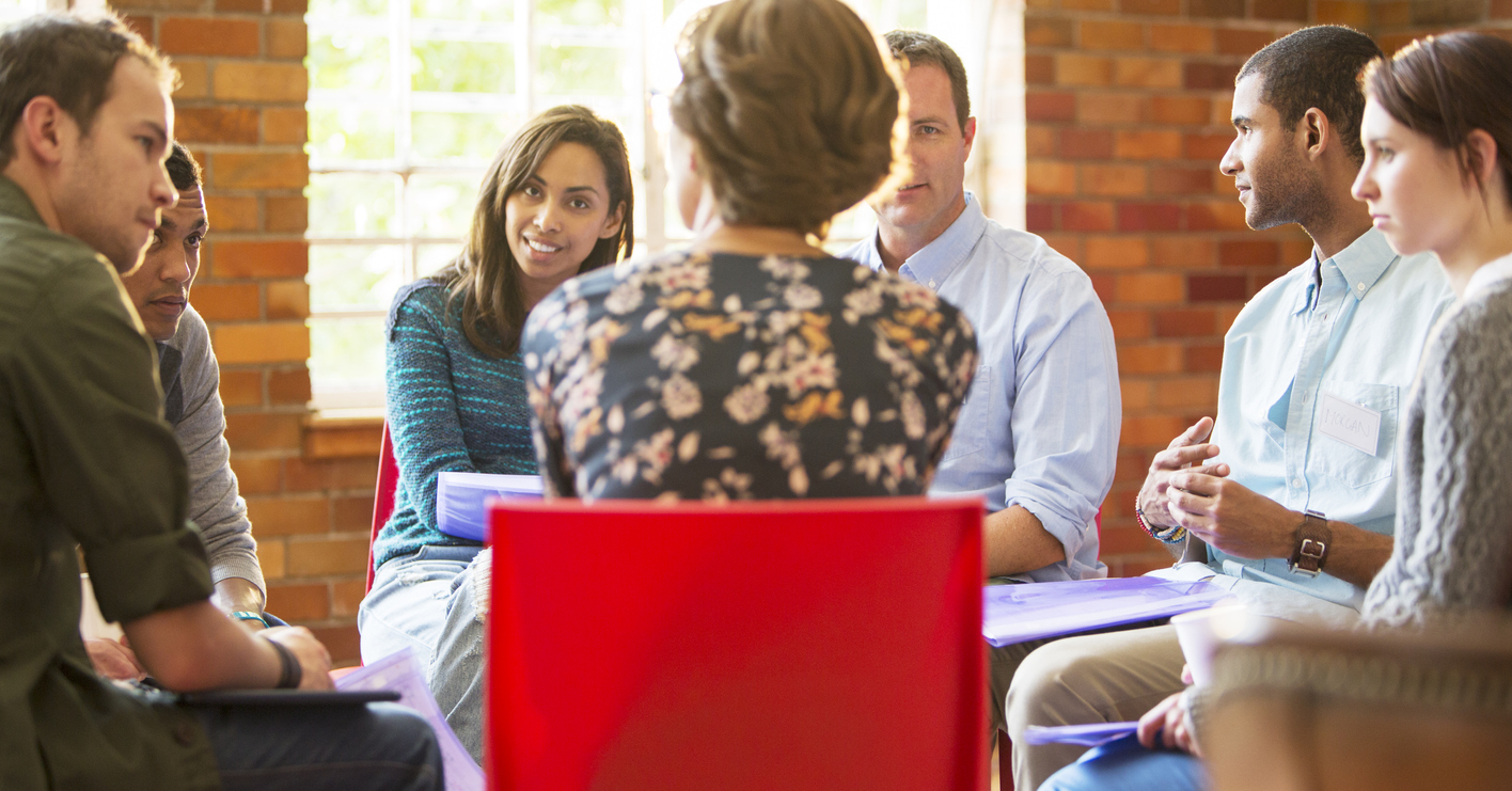 Woman leading group therapy session|feeling-better Why Norwell Residents Trust Our Mindfulness-Based Treatment|Full-Day Treatment Program in MA